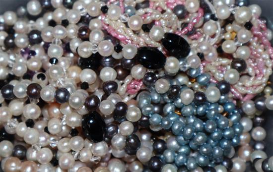 A group of assorted modern mainly cultured pearl necklaces.